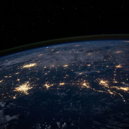 Image Description [A picture of the earth from space, the lights can be seen from thousands of miles away]